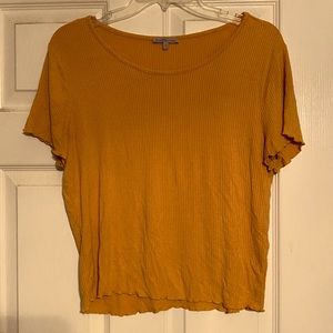 Yellow ruffle trimmed top